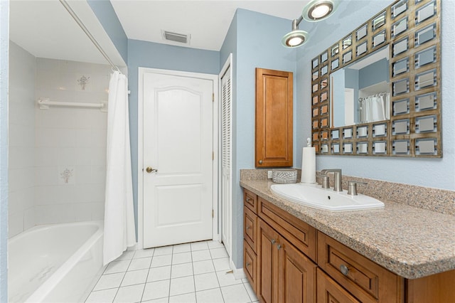 16571 Cape Horn Blvd, Punta Gorda, FL 33955 - full bath featuring tile patterned flooring, shower / tub combo, vanity, and visible vents