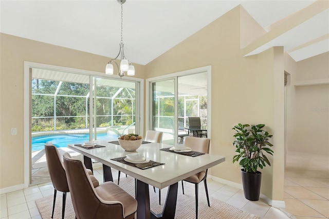 16571 Cape Horn Blvd, Punta Gorda, FL 33955 - dining space with light tile patterned floors, baseboards, lofted ceiling, and a sunroom