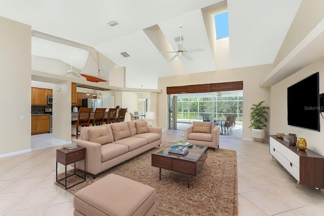16571 Cape Horn Blvd, Punta Gorda, FL 33955 - living room featuring light tile patterned floors, a ceiling fan, visible vents, and high vaulted ceiling