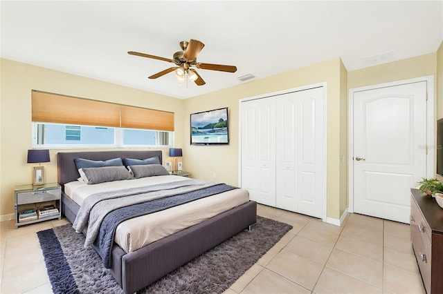 16571 Cape Horn Blvd, Punta Gorda, FL 33955 - bedroom with light tile patterned floors, baseboards, a closet, and ceiling fan