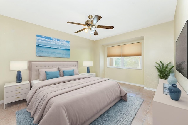 16571 Cape Horn Blvd, Punta Gorda, FL 33955 - bedroom featuring light tile patterned flooring, a ceiling fan, and baseboards
