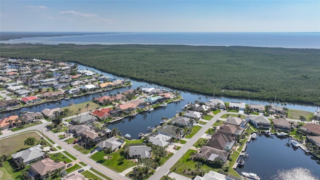 bird's eye view with a residential view and a water view