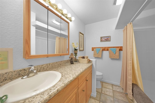 full bath with toilet, visible vents, tiled shower, and vanity