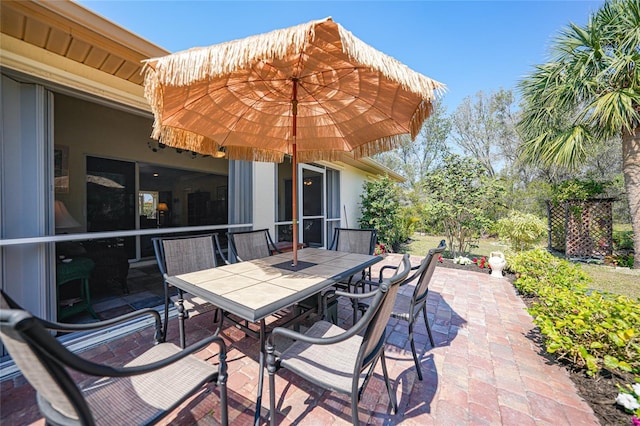 view of patio featuring outdoor dining area