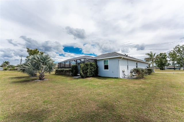 view of yard featuring a lanai