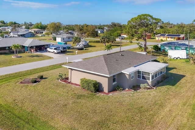 drone / aerial view featuring a residential view