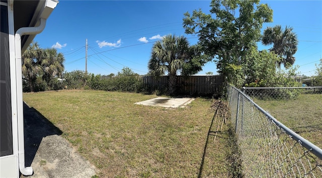 view of yard with a fenced backyard