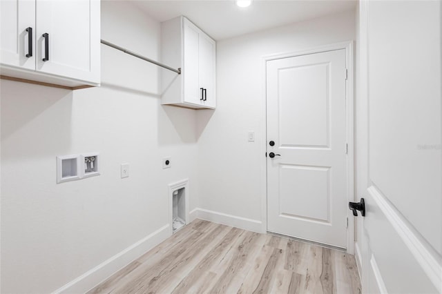 laundry room featuring hookup for a washing machine, cabinet space, hookup for an electric dryer, light wood-type flooring, and baseboards