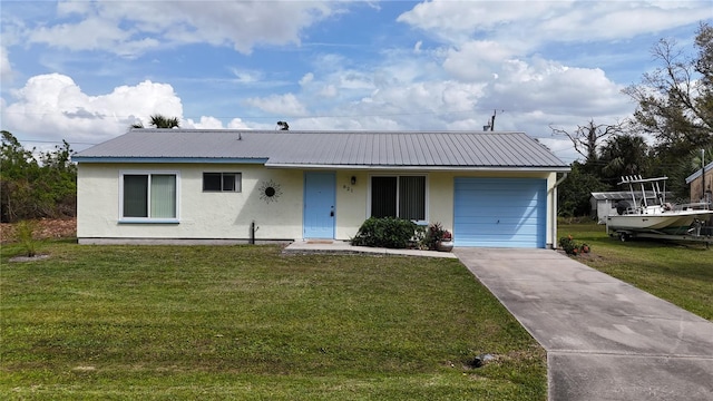 view of front of house with metal roof, a front lawn, and stucco siding