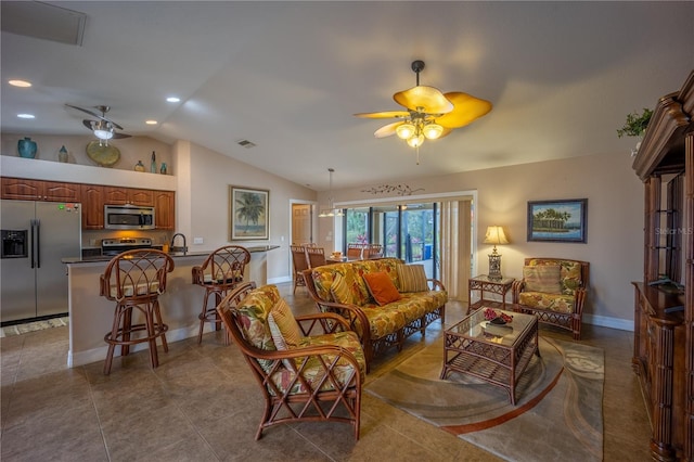 living room with ceiling fan, recessed lighting, visible vents, baseboards, and vaulted ceiling