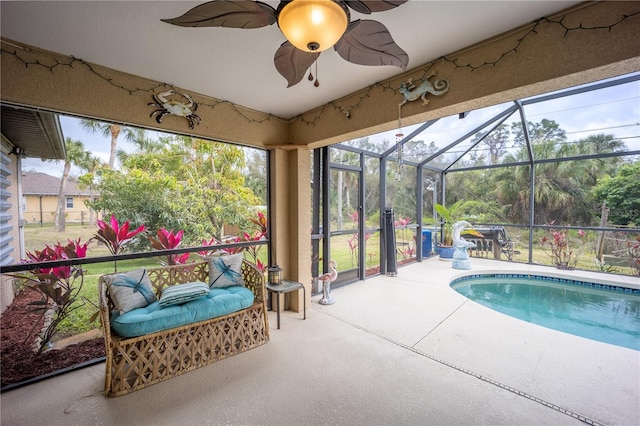 view of swimming pool with a ceiling fan