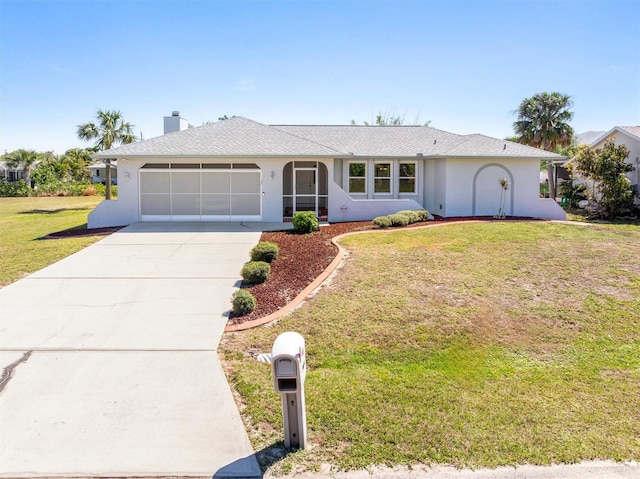 ranch-style home with a garage, concrete driveway, a front yard, and stucco siding