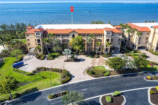 aerial view with a residential view and a water view