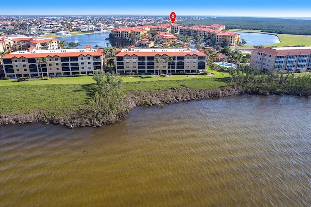 drone / aerial view with a water view