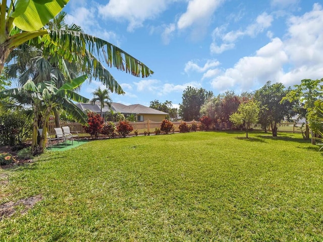 view of yard with fence