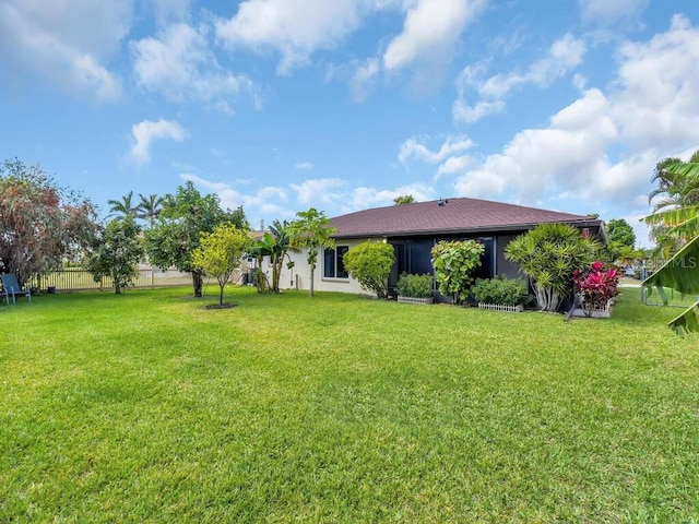 view of yard featuring fence