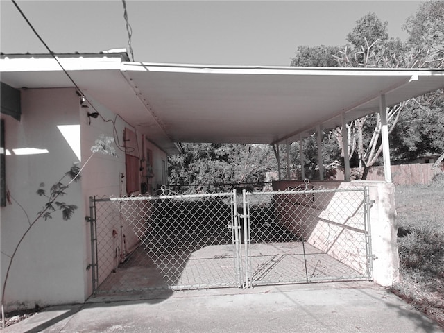 exterior space featuring a gate and fence