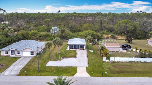 bird's eye view featuring a forest view