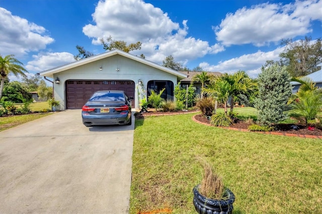 ranch-style house with a garage, concrete driveway, and a front yard