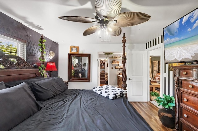 bedroom with a ceiling fan and wood finished floors