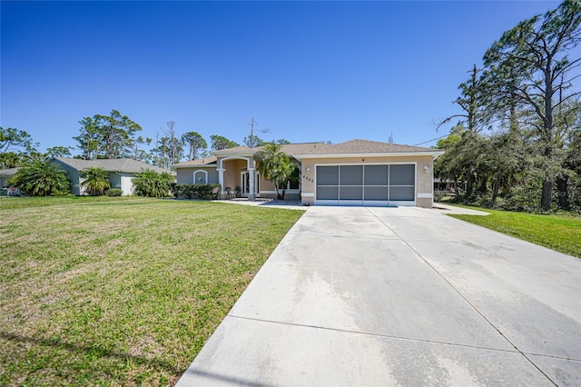 single story home featuring stucco siding, driveway, a front lawn, and an attached garage