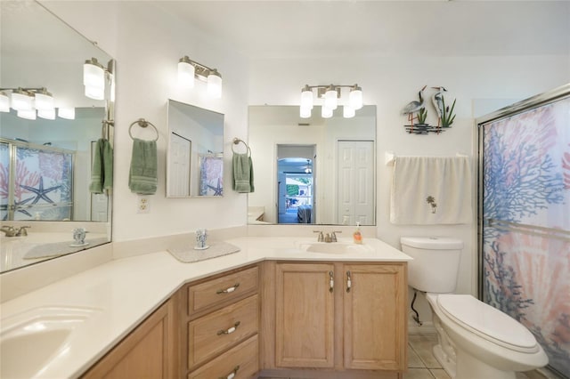 full bath with toilet, double vanity, a shower with curtain, and a sink