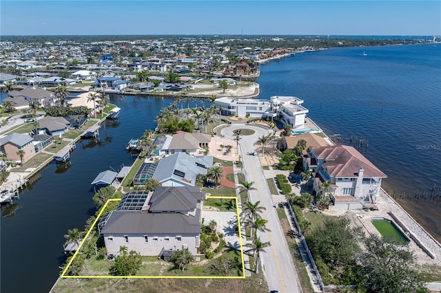 aerial view featuring a water view and a residential view