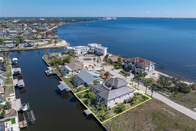 aerial view featuring a water view and a residential view