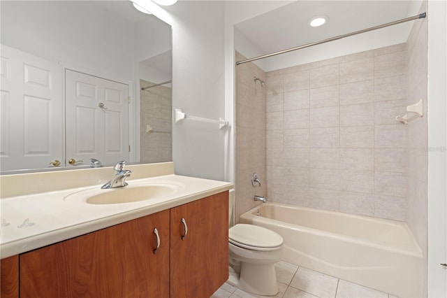 bathroom featuring toilet, vanity, shower / bathing tub combination, and tile patterned floors