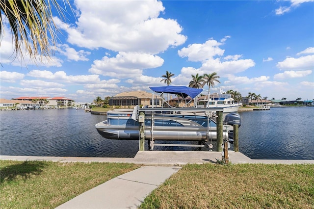 view of dock with a water view and boat lift