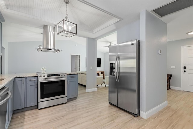 kitchen featuring lofted ceiling, gray cabinetry, visible vents, appliances with stainless steel finishes, and ventilation hood