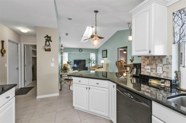 kitchen with tasteful backsplash, dishwasher, open floor plan, a peninsula, and light tile patterned flooring