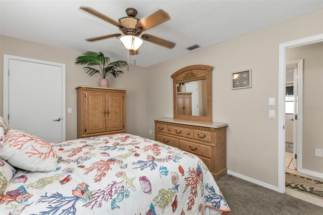 bedroom with carpet, visible vents, ceiling fan, and baseboards