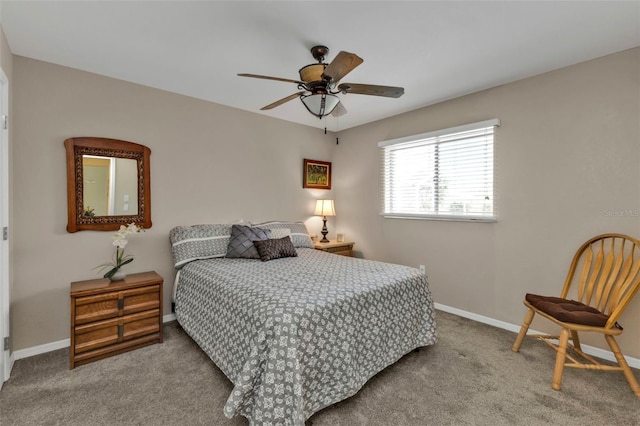 bedroom with carpet, ceiling fan, and baseboards