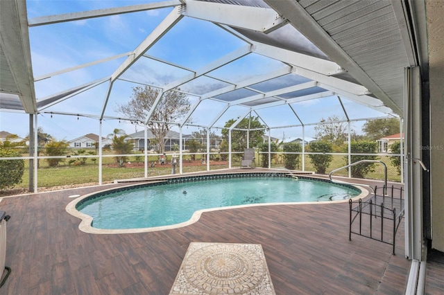 pool with a patio area and a lanai