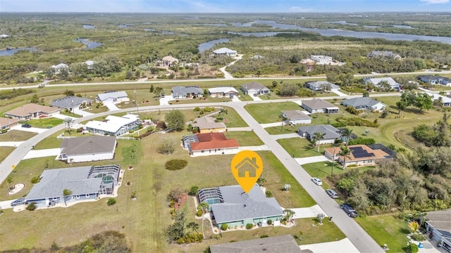 birds eye view of property with a residential view