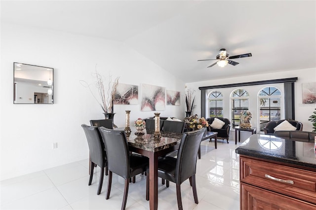 20339 Gentry Ave, Port Charlotte, FL 33952 - dining area featuring ceiling fan, vaulted ceiling, and light tile patterned floors