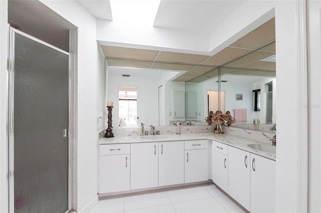 20339 Gentry Ave, Port Charlotte, FL 33952 - bathroom with a shower stall, double vanity, and a sink