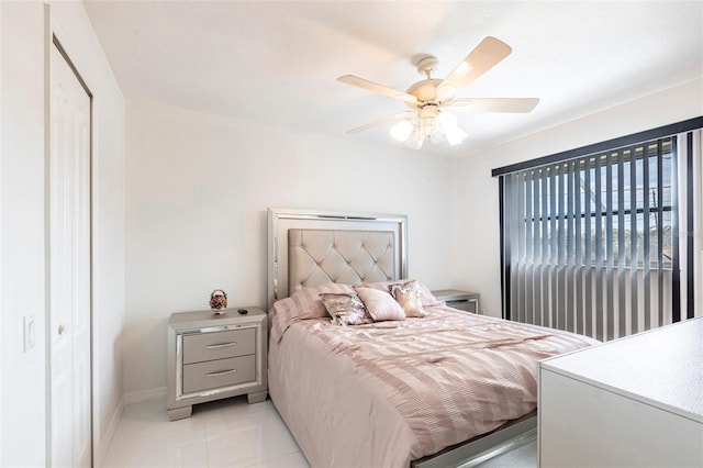 20339 Gentry Ave, Port Charlotte, FL 33952 - bedroom featuring ceiling fan, light tile patterned floors, and baseboards