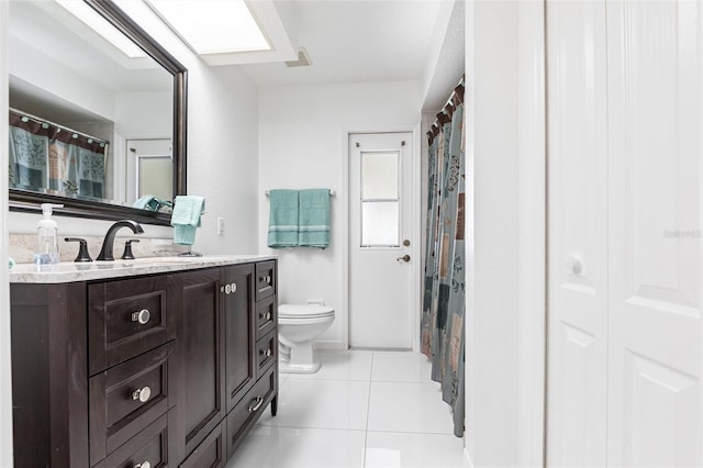 20339 Gentry Ave, Port Charlotte, FL 33952 - full bathroom featuring toilet, tile patterned floors, vanity, and visible vents