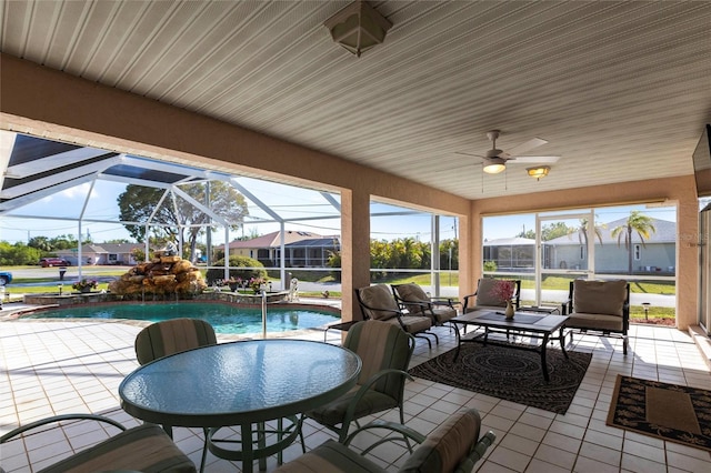 20339 Gentry Ave, Port Charlotte, FL 33952 - view of patio / terrace featuring a lanai, an outdoor pool, outdoor dining space, and ceiling fan