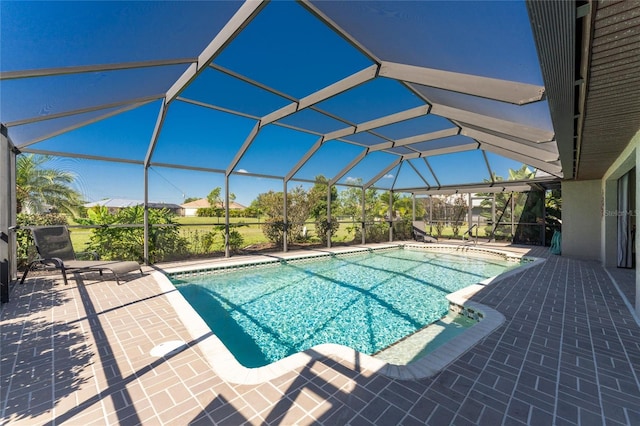 pool with a lanai and a patio