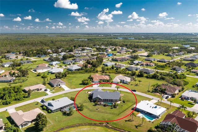 birds eye view of property with a residential view