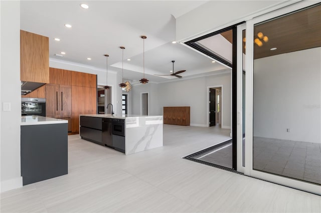 kitchen featuring recessed lighting, light countertops, brown cabinets, dishwasher, and modern cabinets