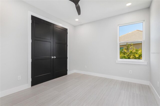 1631 Casey Key Dr, Punta Gorda, FL 33950 - unfurnished bedroom with baseboards, recessed lighting, and a ceiling fan
