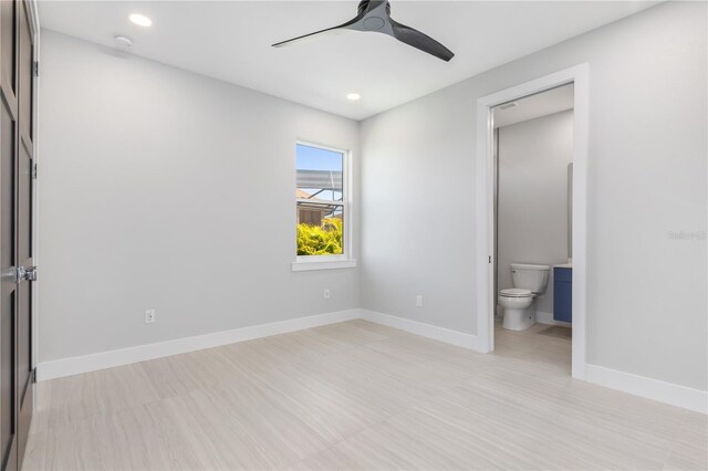 1631 Casey Key Dr, Punta Gorda, FL 33950 - unfurnished bedroom with recessed lighting, ensuite bathroom, baseboards, and ceiling fan
