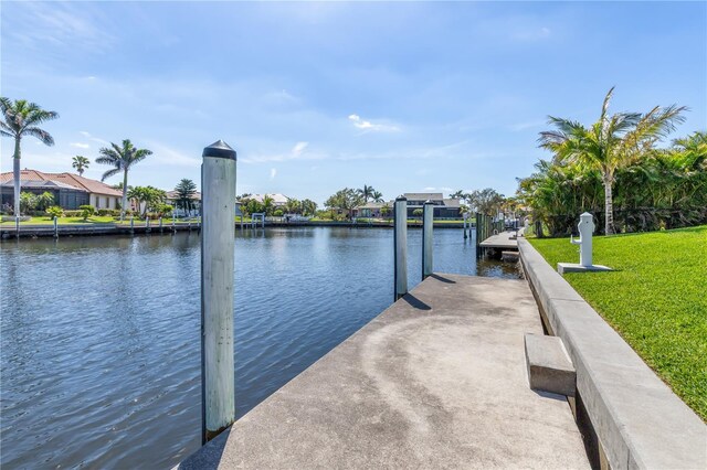 1631 Casey Key Dr, Punta Gorda, FL 33950 - dock area with a water view and a yard