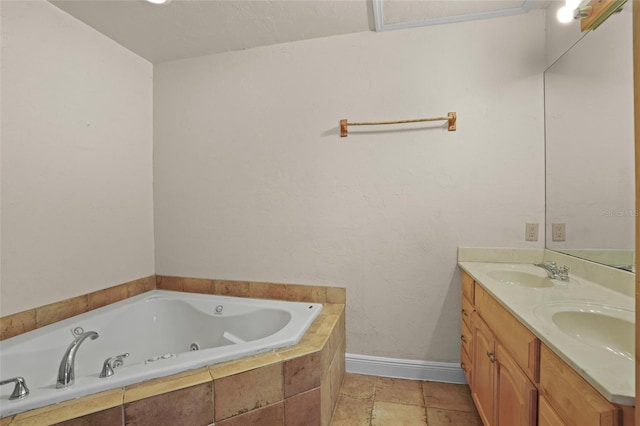 bathroom featuring baseboards, a sink, a tub with jets, and double vanity