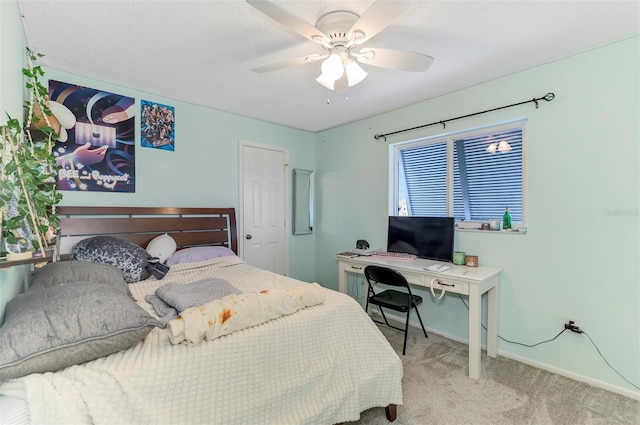 bedroom featuring carpet flooring, ceiling fan, and baseboards