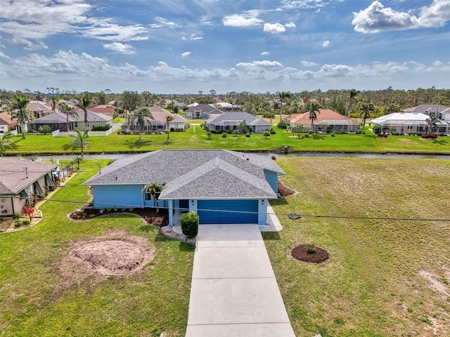 drone / aerial view featuring a residential view